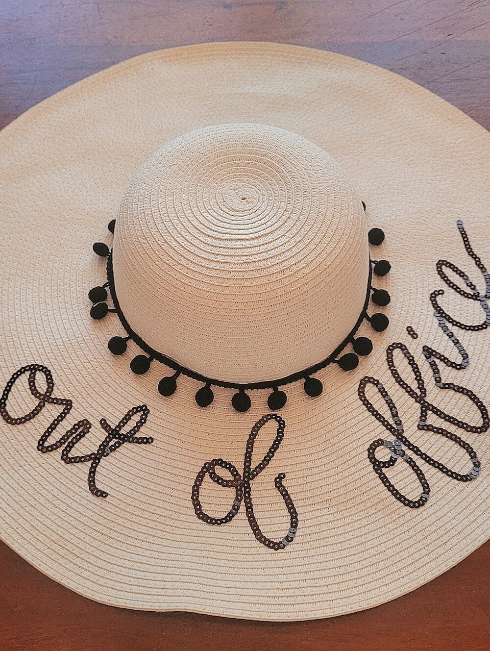 Cato Cream Wide-Brim Hat with Black Pom Pom & Sequin Script Trim